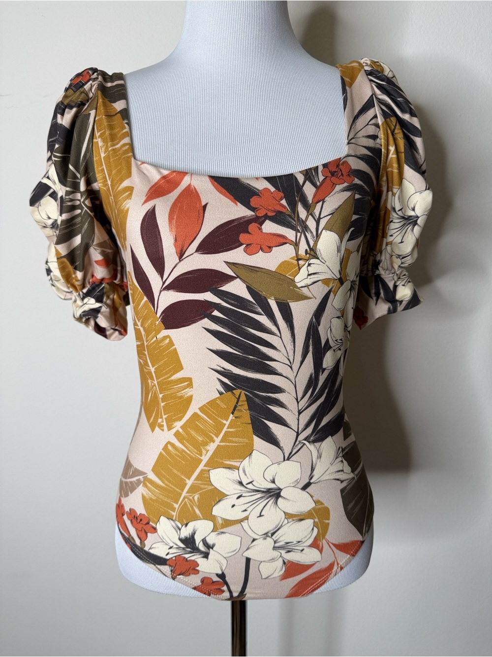 ELA Orange and Green Floral Puff Sleeve Tie Back Bodysuit
